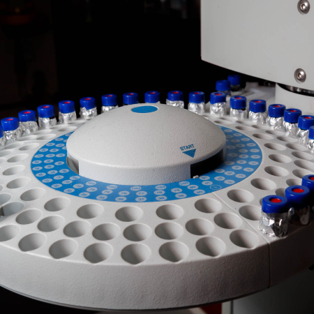 Autosampler on gas chromatograph used in biomonitoring studies to measure brominated flame retardants in serum