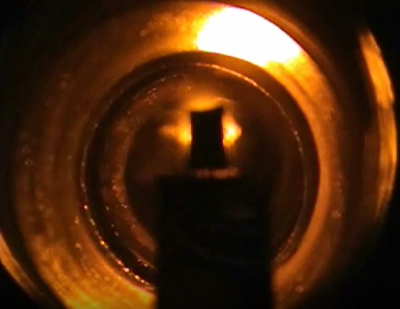 A tungsten filament excites sodium atoms